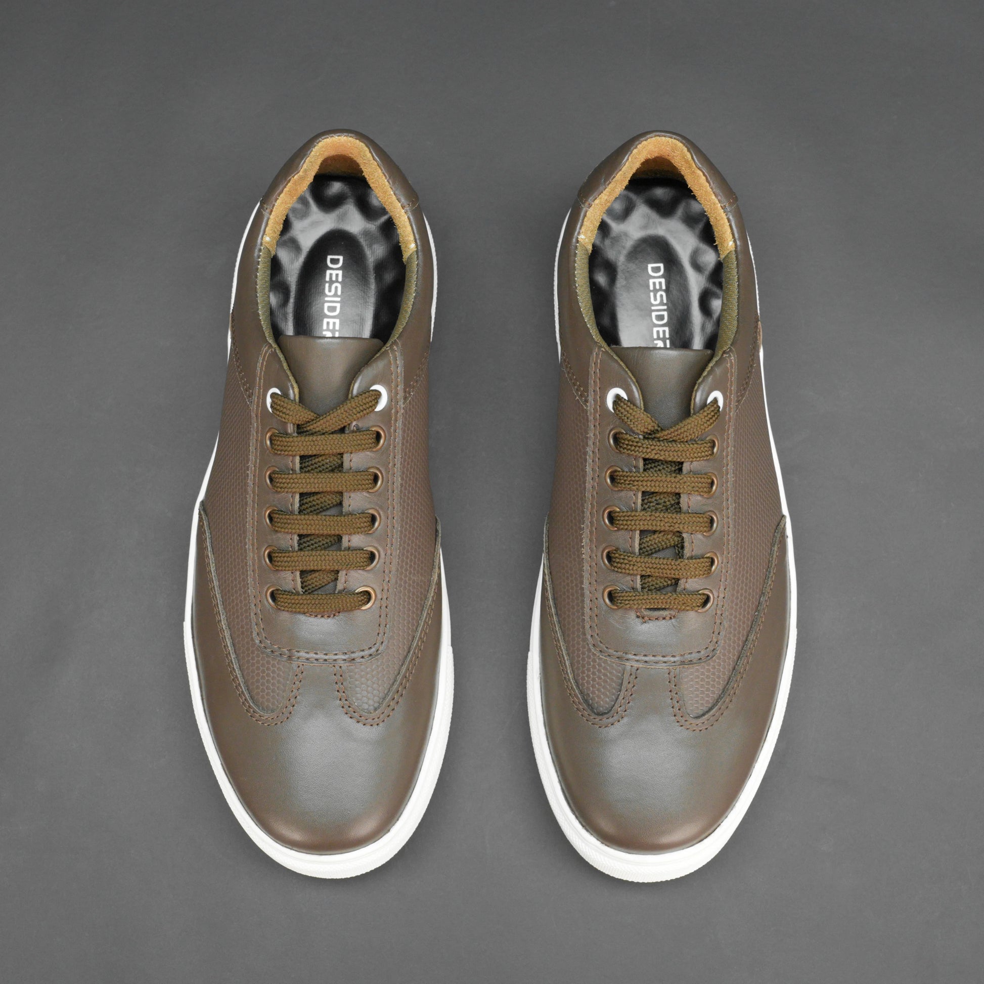 Brown cow printed leather sneakers with mesh lining and TPR sole for comfort and durability