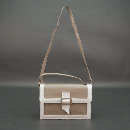 Camel leather crossbody handbag with zipper compartment.