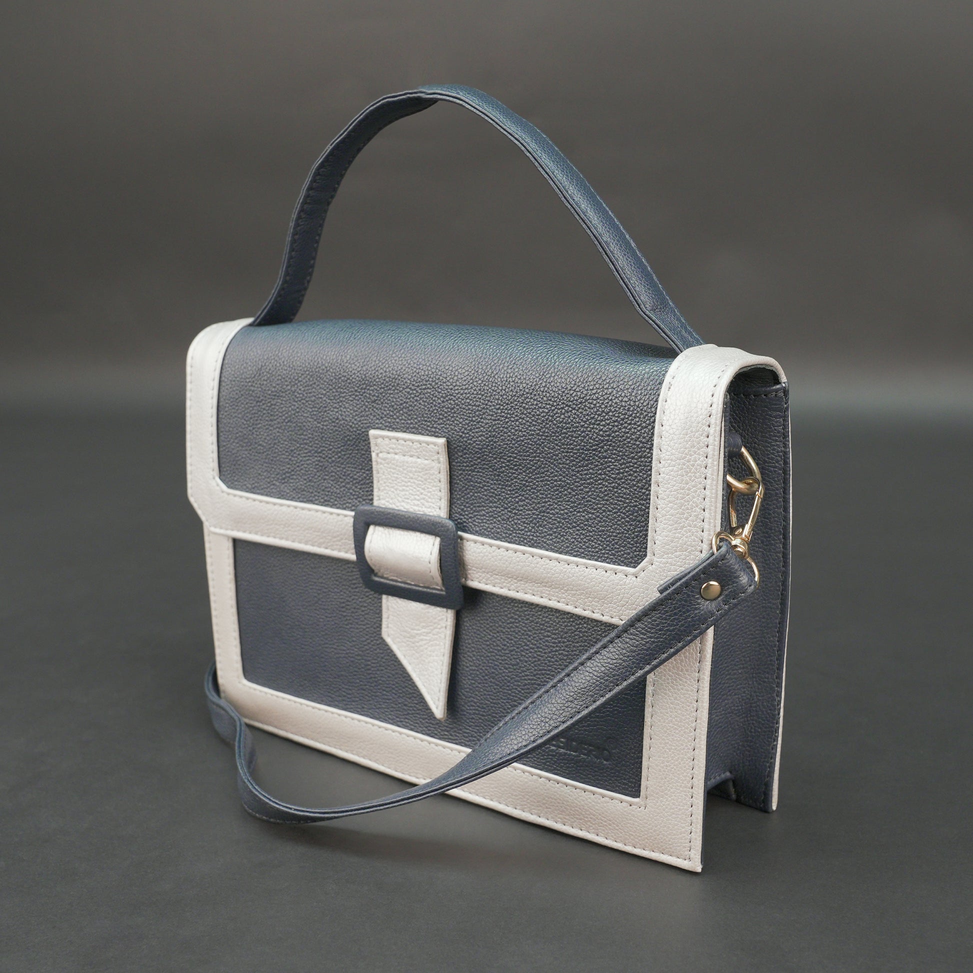 Dark blue leather crossbody handbag with zipper compartment and pocket.