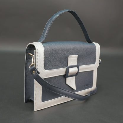 Dark blue leather crossbody handbag with zipper compartment and pocket.