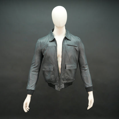 Men’s black leather jacket with zip closure, two side pockets, one left arm pocket, and one inside pocket, combining style and everyday functionality