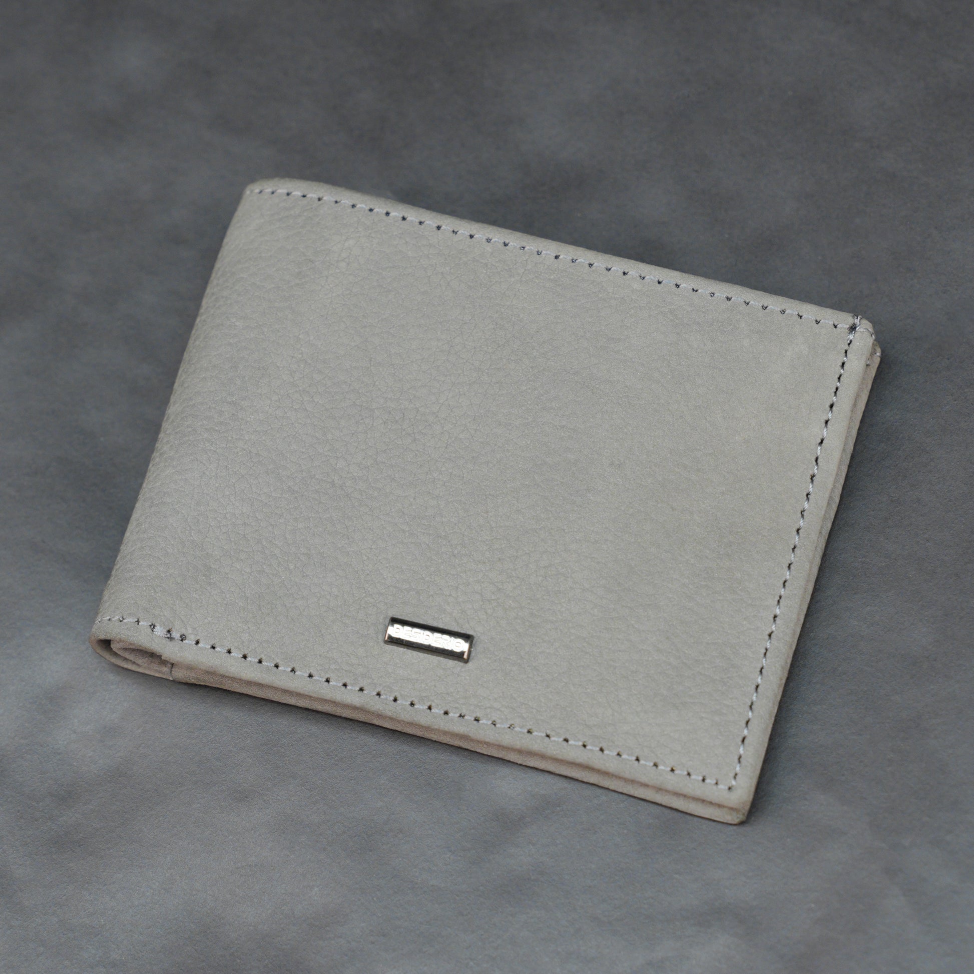 Grey leather wallet with 10 card slots and 2 cash compartments, sleek, slim, and durable for everyday use