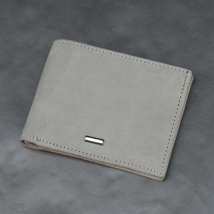Grey leather wallet with 10 card slots and 2 cash compartments, sleek, slim, and durable for everyday use