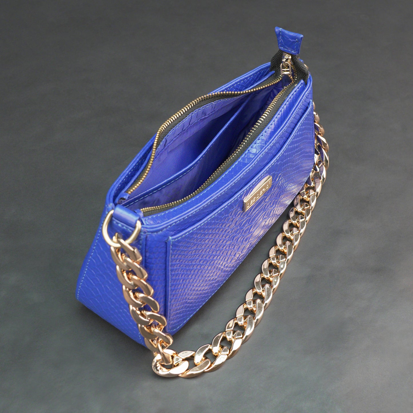 Real leather handbag with gold chain, spacious compartment, zipper pocket, outer pocket, available in multiple colors for daily use