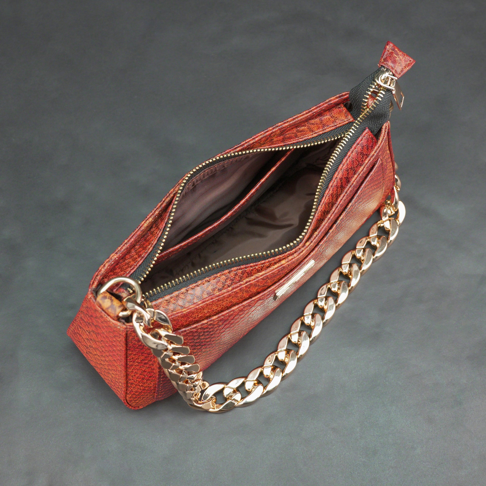 Real leather handbag with gold chain, spacious compartment, zipper pocket, outer pocket, available in multiple colors for daily use