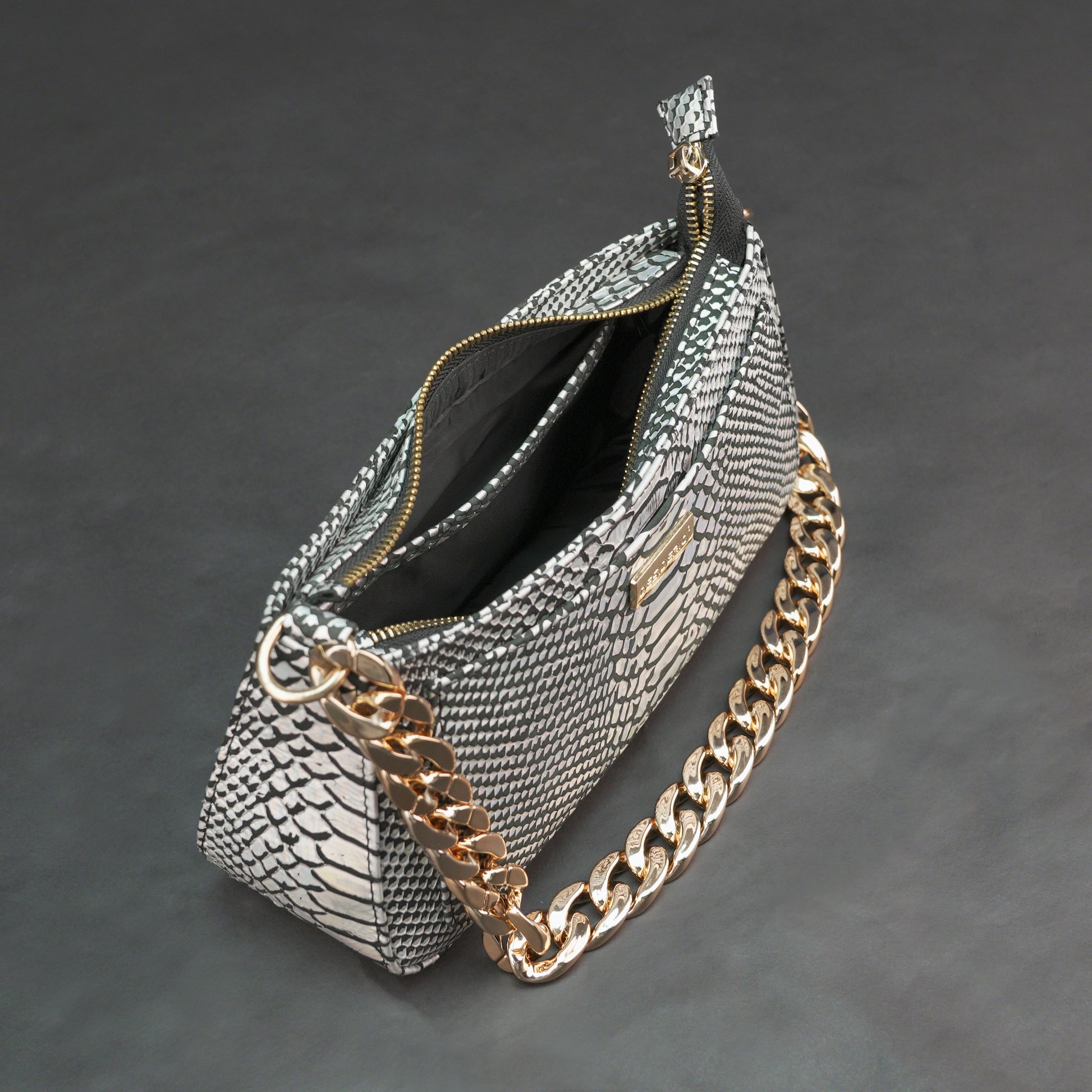 Real leather handbag with gold chain, spacious compartment, zipper pocket, outer pocket, available in multiple colors for daily use