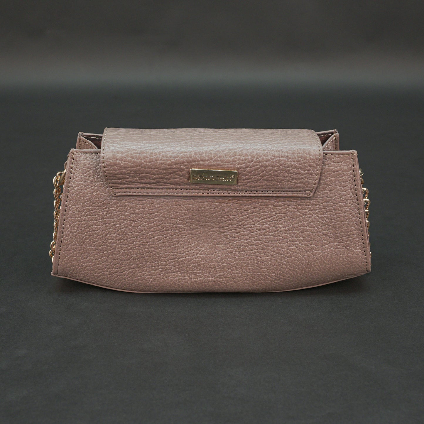 Brown real leather handbag with brass chain and zip compartment.