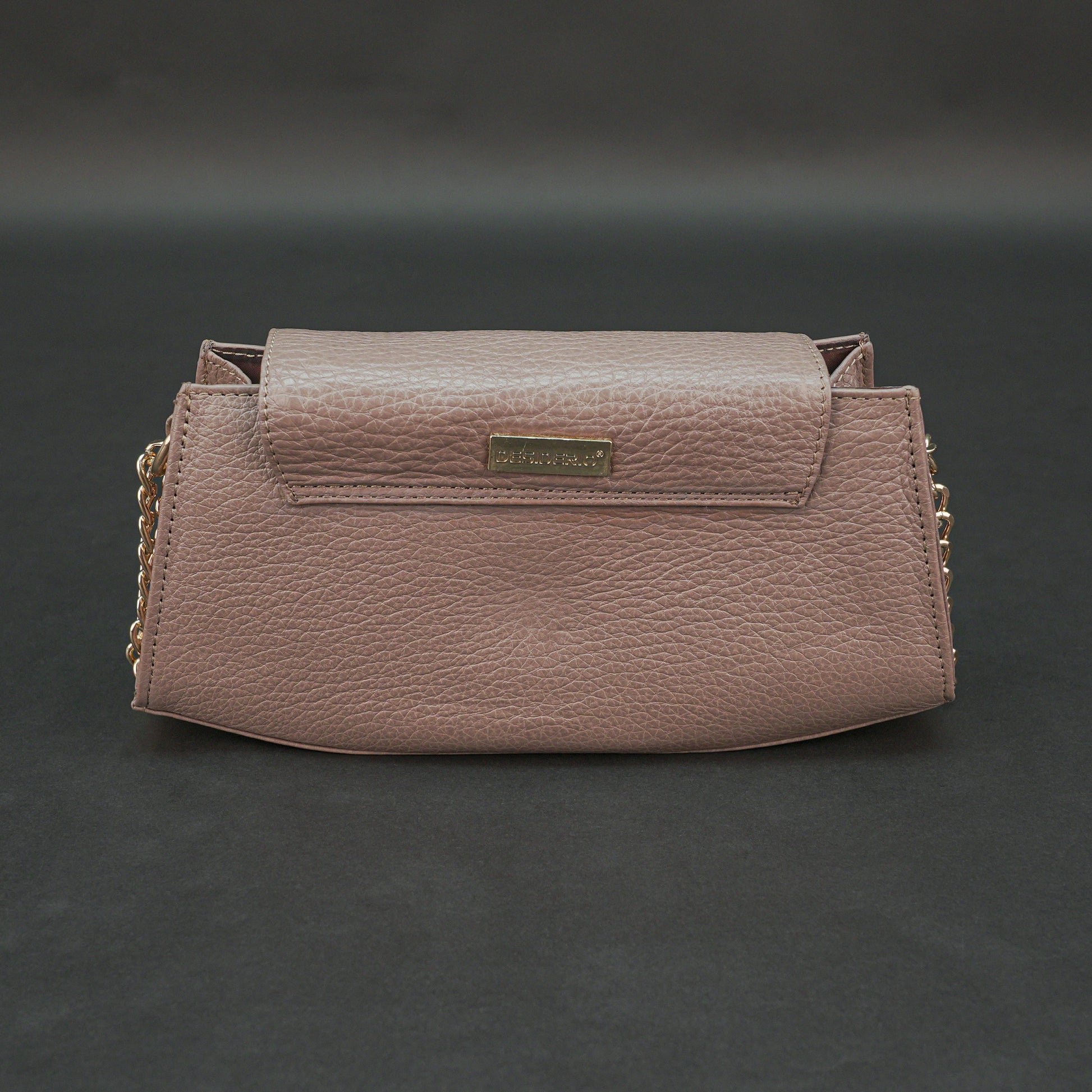 Brown real leather handbag with brass chain and zip compartment.