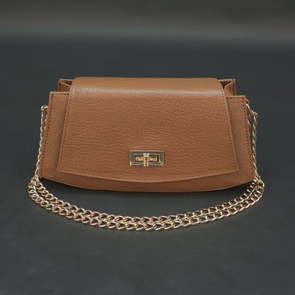 Tan leather handbag with chain and zipper.