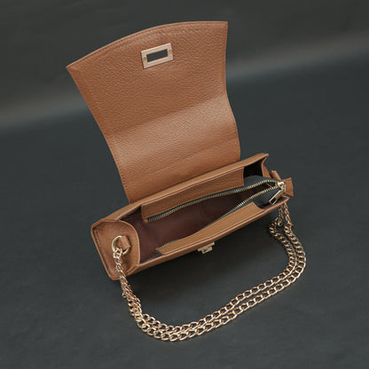 Tan leather handbag with chain and zipper.