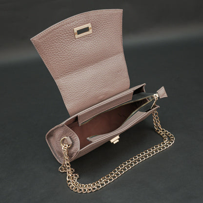 Brown real leather handbag with brass chain and zip compartment.