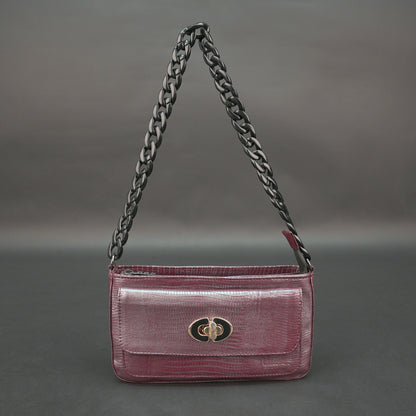 Maroon leather handbag with chain and pocket.