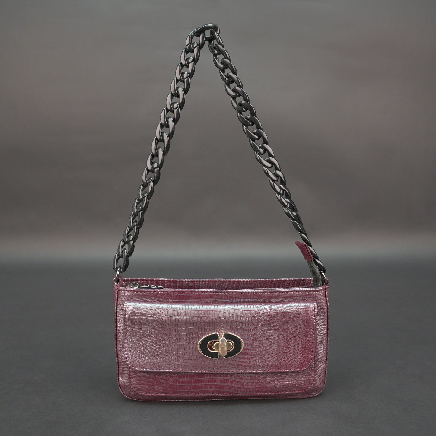 Real leather maroon handbag with metal chain, zipper main compartment, outer pocket, shoulder strap, stylish daily use bag