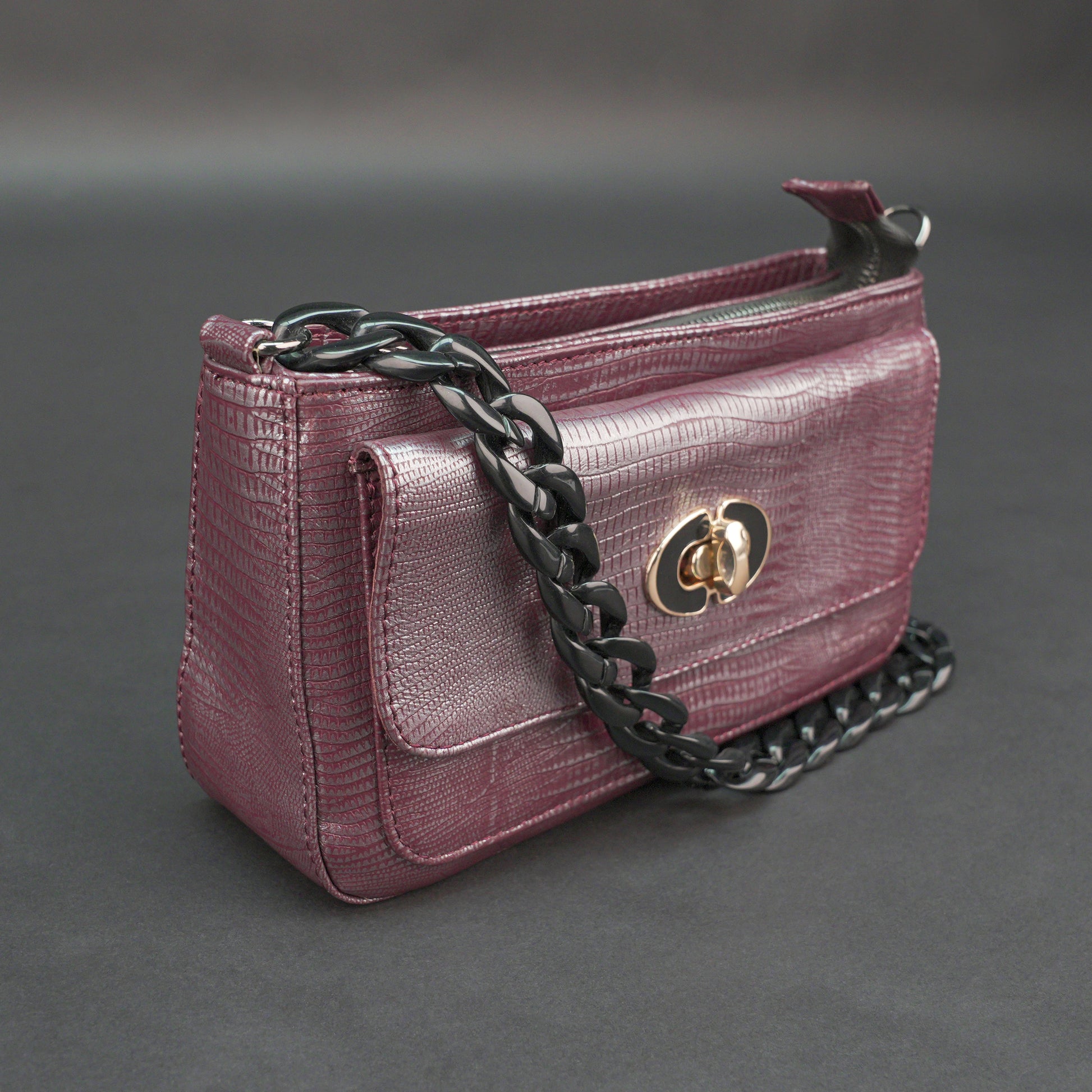 Real leather maroon handbag with metal chain, zipper main compartment, outer pocket, shoulder strap, stylish daily use bag