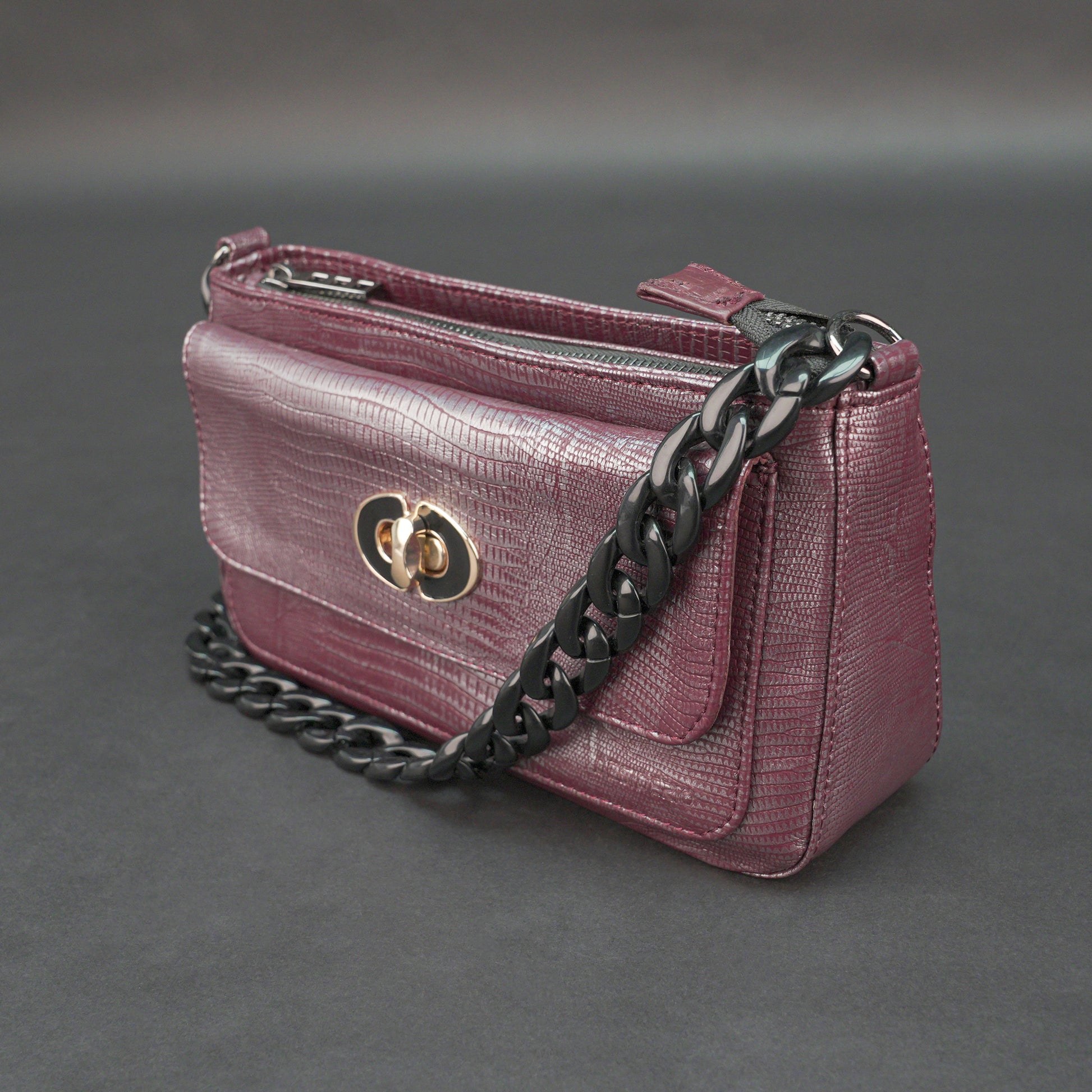 Real leather maroon handbag with metal chain, zipper main compartment, outer pocket, shoulder strap, stylish daily use bag