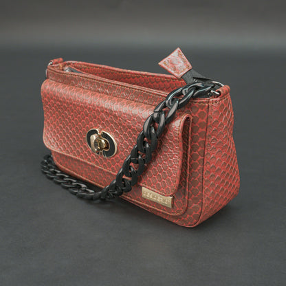 Brown leather handbag with metal chain and zipper compartment.