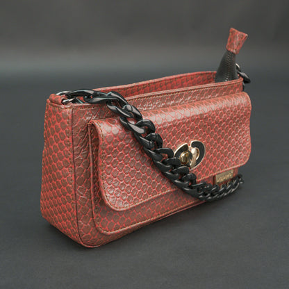 Brown leather handbag with metal chain and zipper compartment.