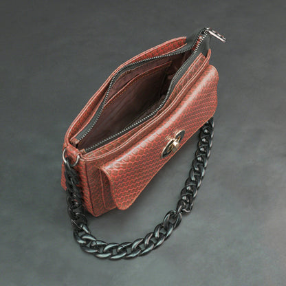 Brown leather handbag with metal chain and zipper compartment.