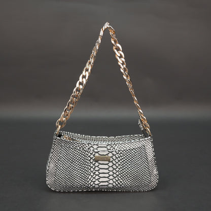 Real leather handbag with gold chain and zipper compartment.