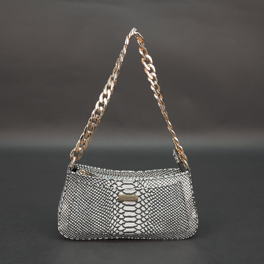 Real leather handbag with gold chain and zipper compartment.