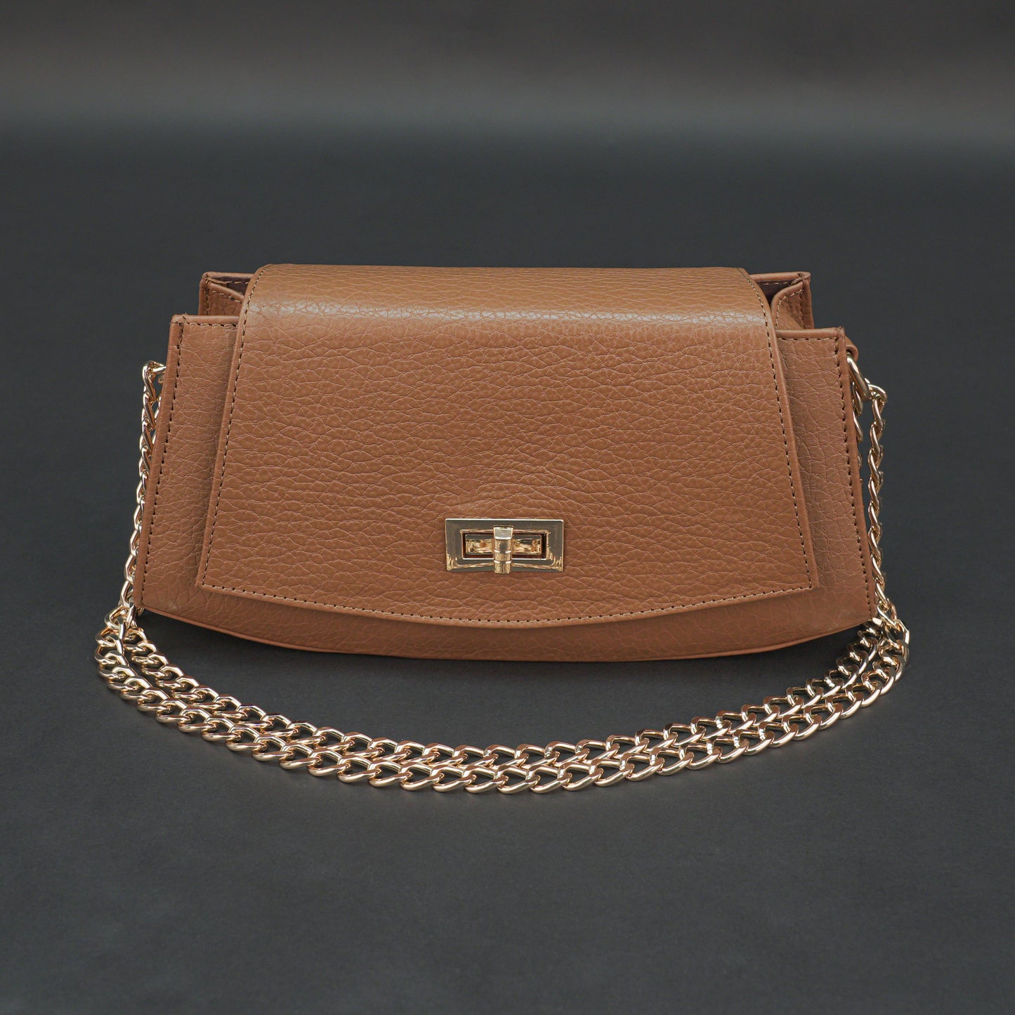 Real leather tan handbag with brass chain, zipper compartment, shoulder strap, stylish and practical daily use bag