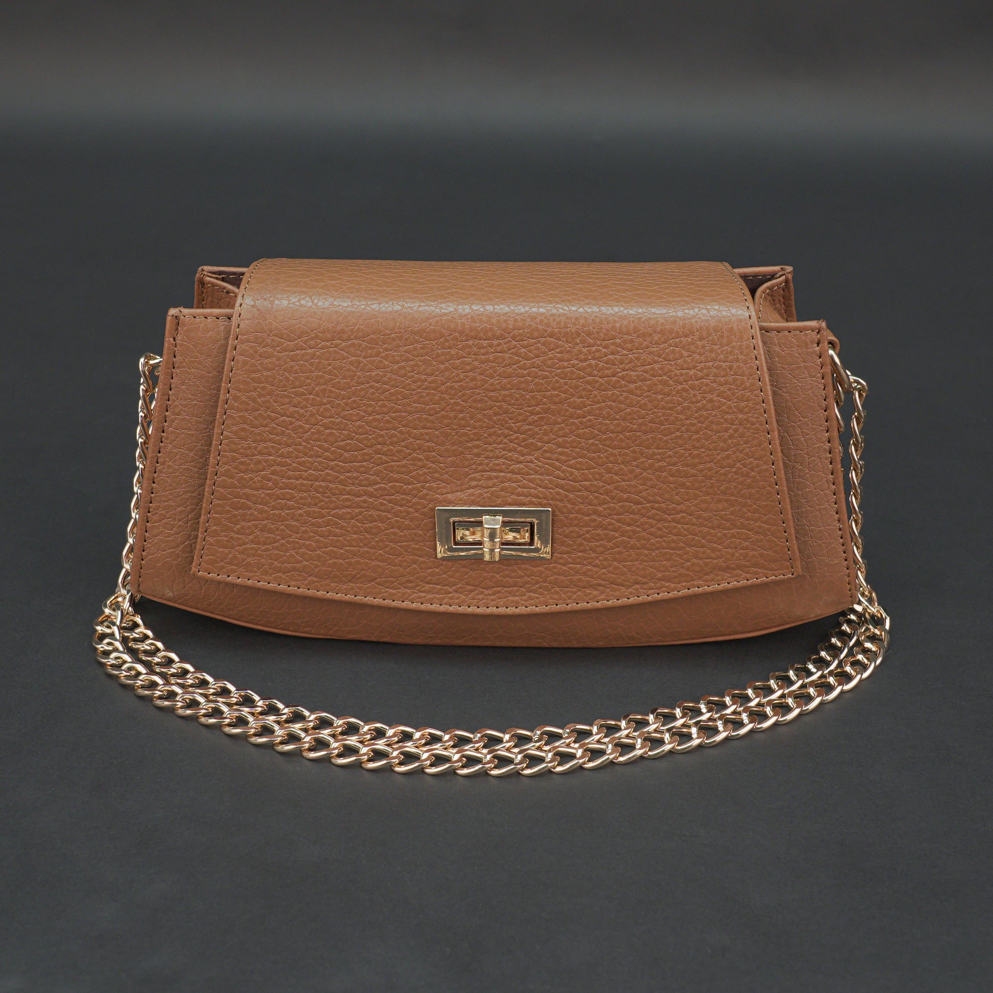 Real leather tan handbag with brass chain, zipper compartment, shoulder strap, stylish and practical daily use bag