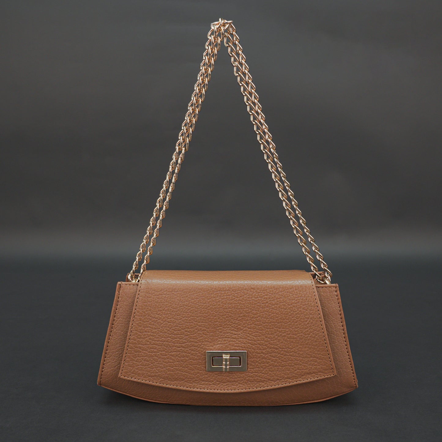Real leather tan handbag with brass chain, zipper compartment, shoulder strap, stylish and practical daily use bag