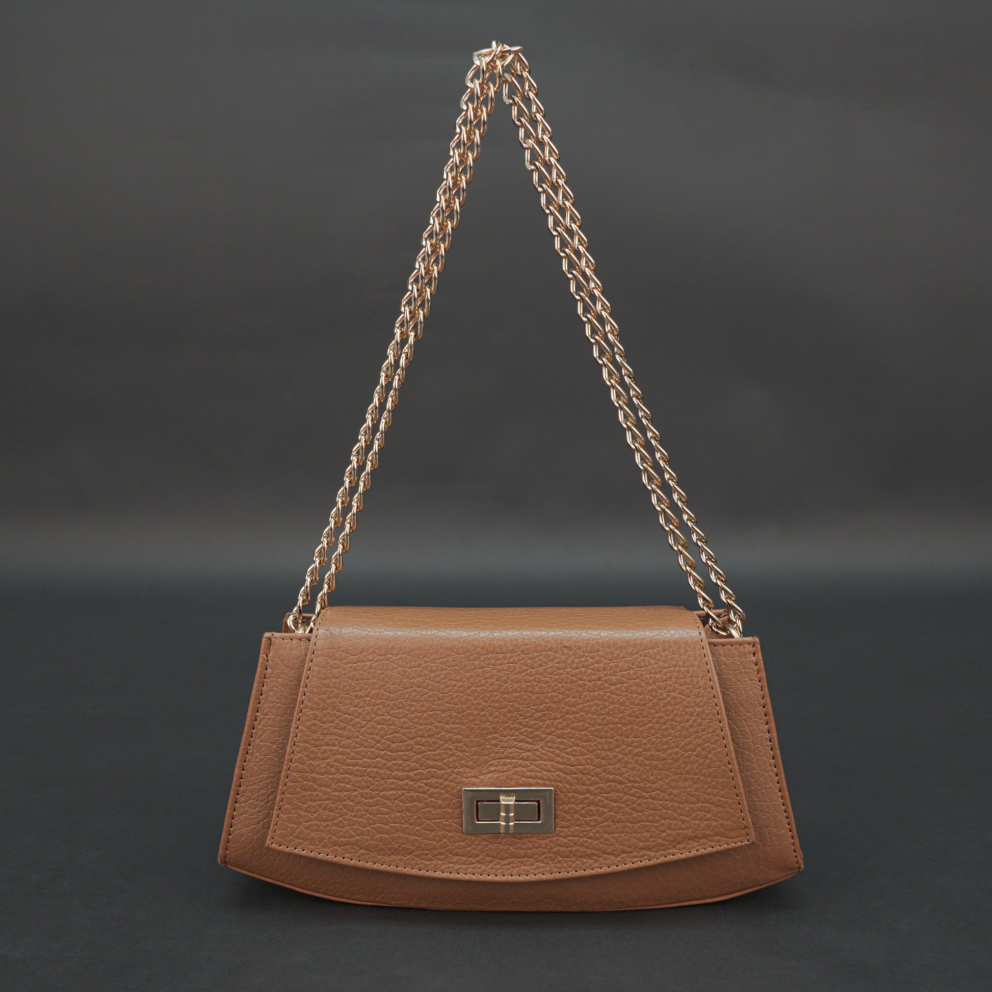 Real leather tan handbag with brass chain, zipper compartment, shoulder strap, stylish and practical daily use bag