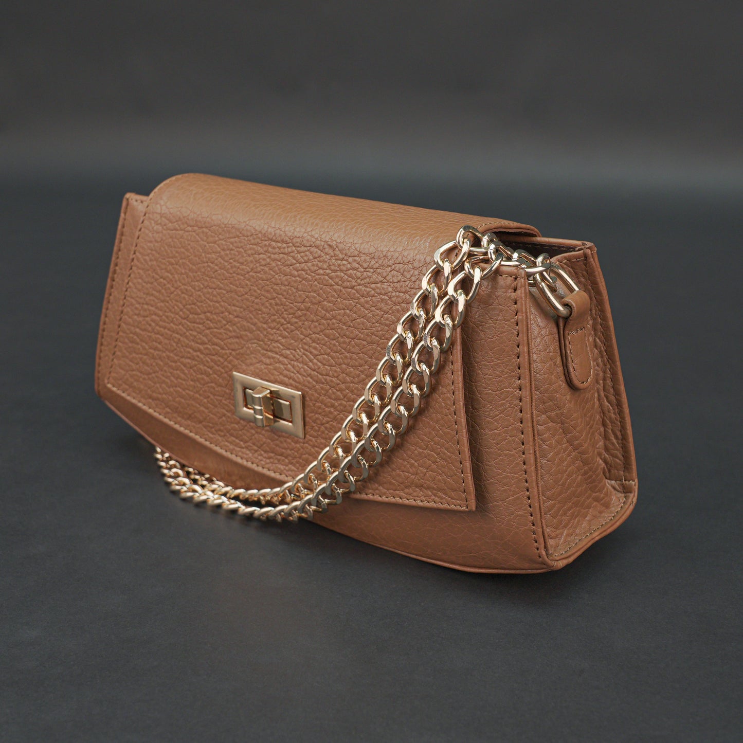 Real leather tan handbag with brass chain, zipper compartment, shoulder strap, stylish and practical daily use bag