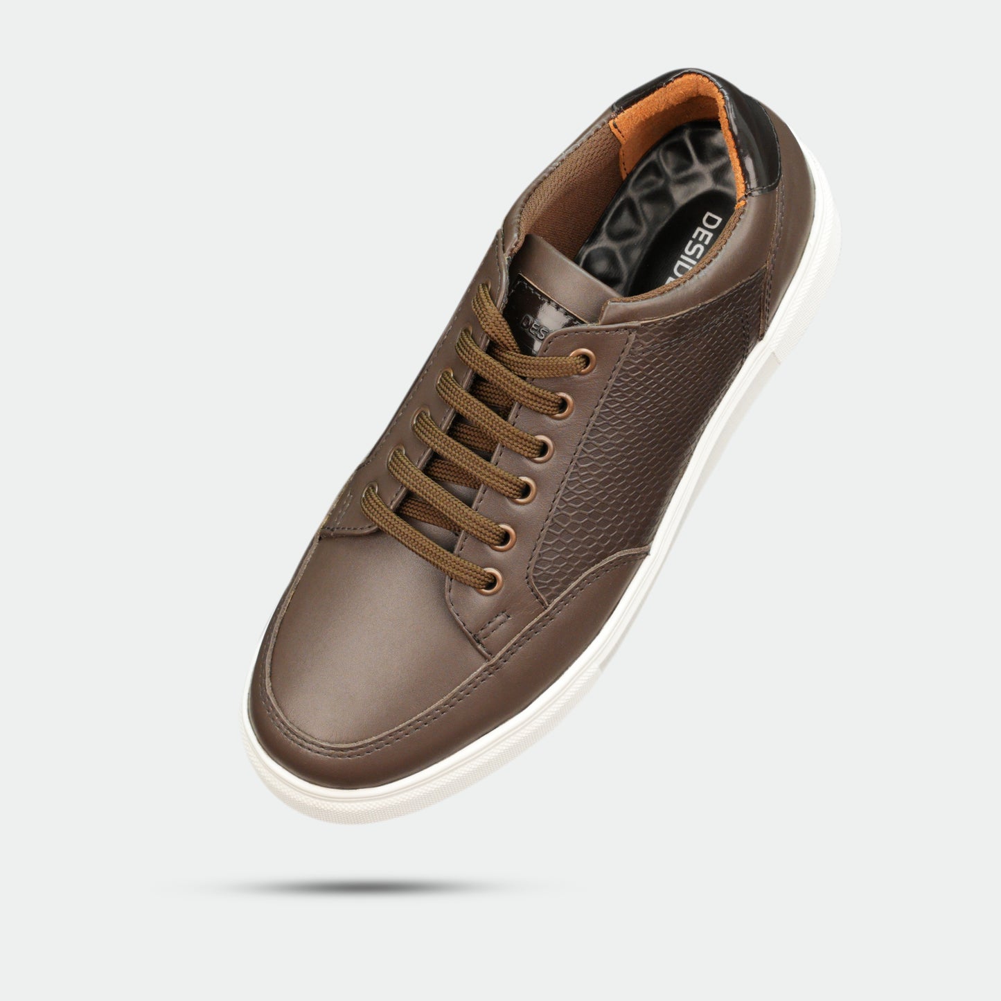 Brown tri-tone cow leather sneakers with breathable mesh lining and flexible TPR sole.