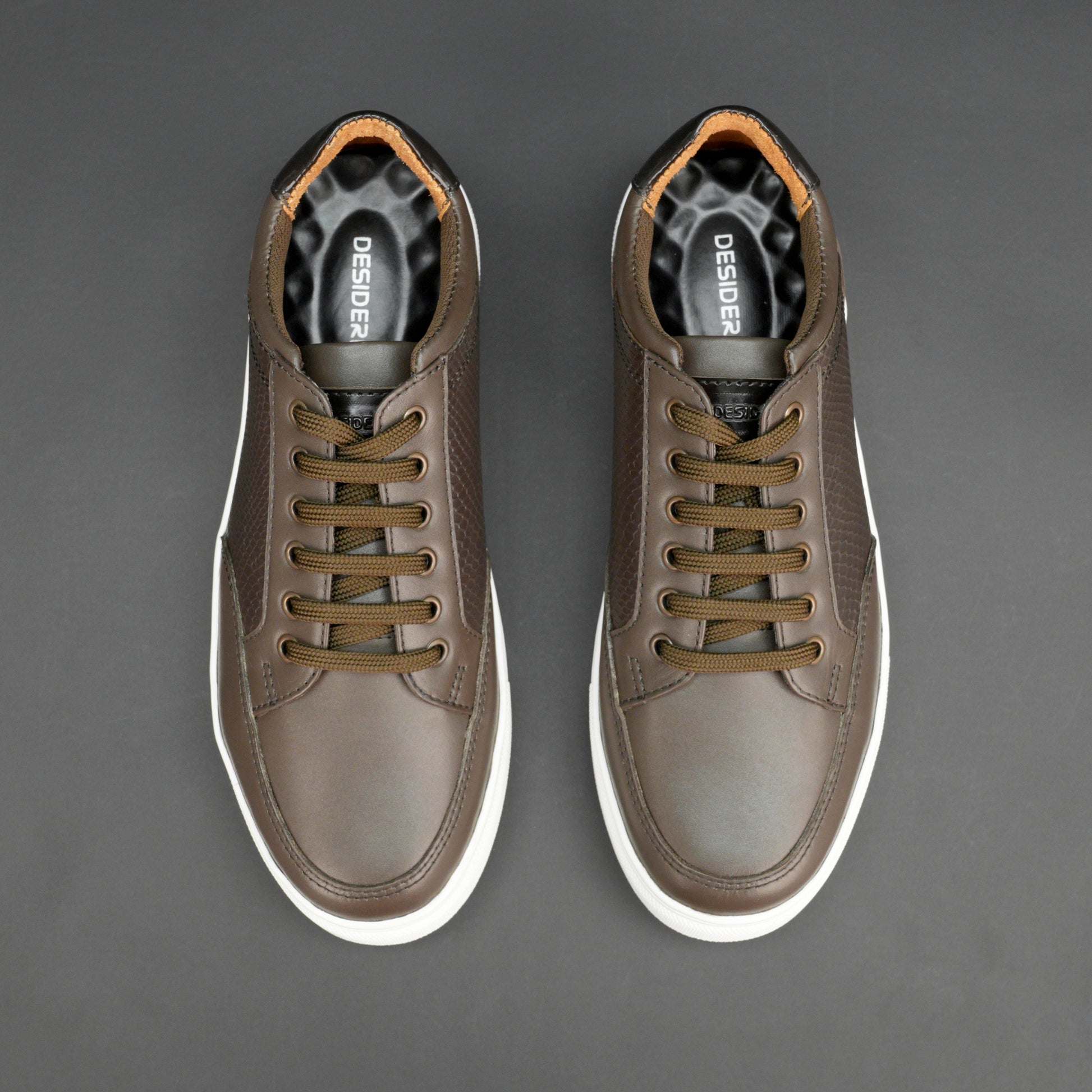 Brown tri-tone cow leather sneakers with breathable mesh lining and flexible TPR sole.