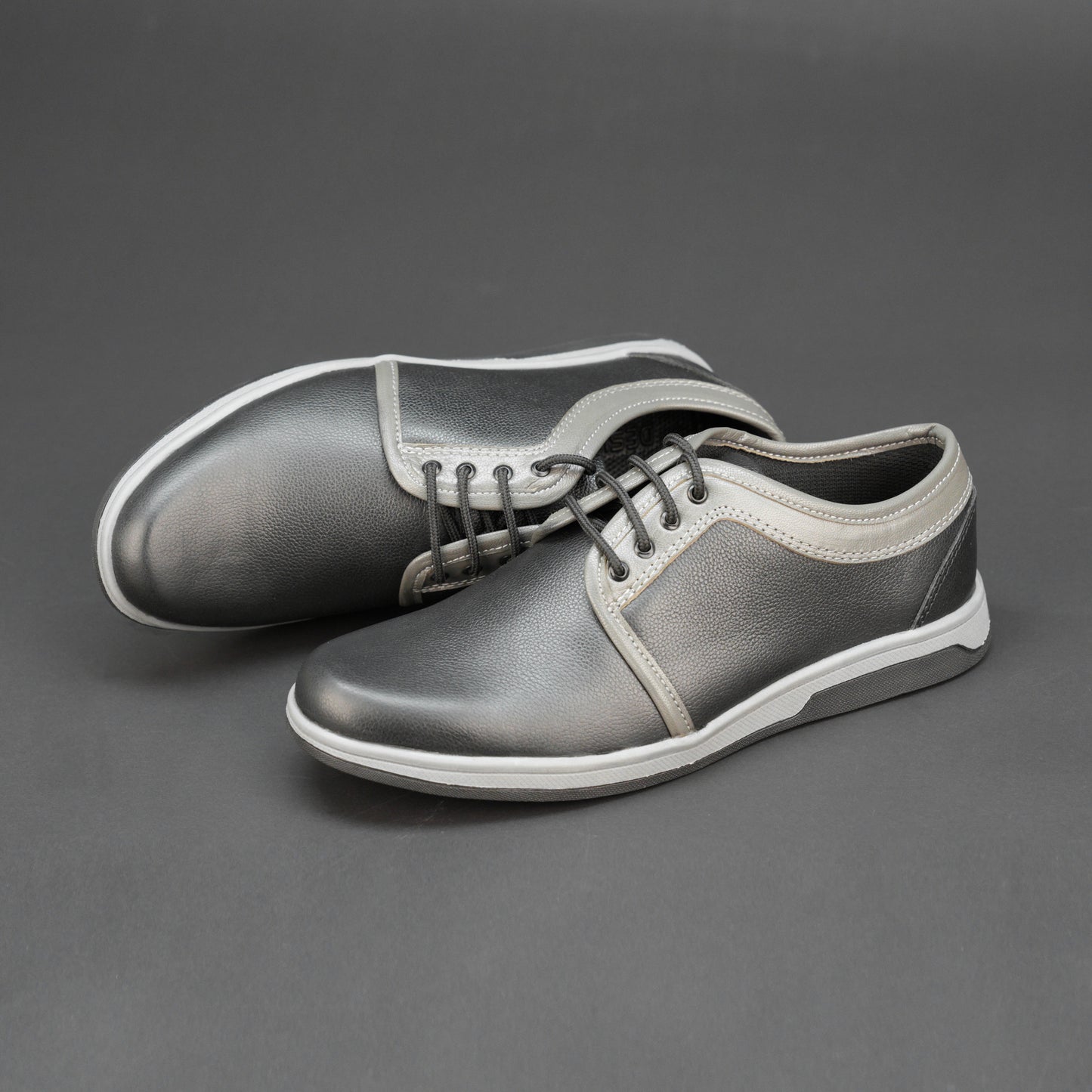Grey Cow Chalsia leather shoes with breathable mesh lining and durable TPR sole. Perfect for everyday comfort and casual wear
