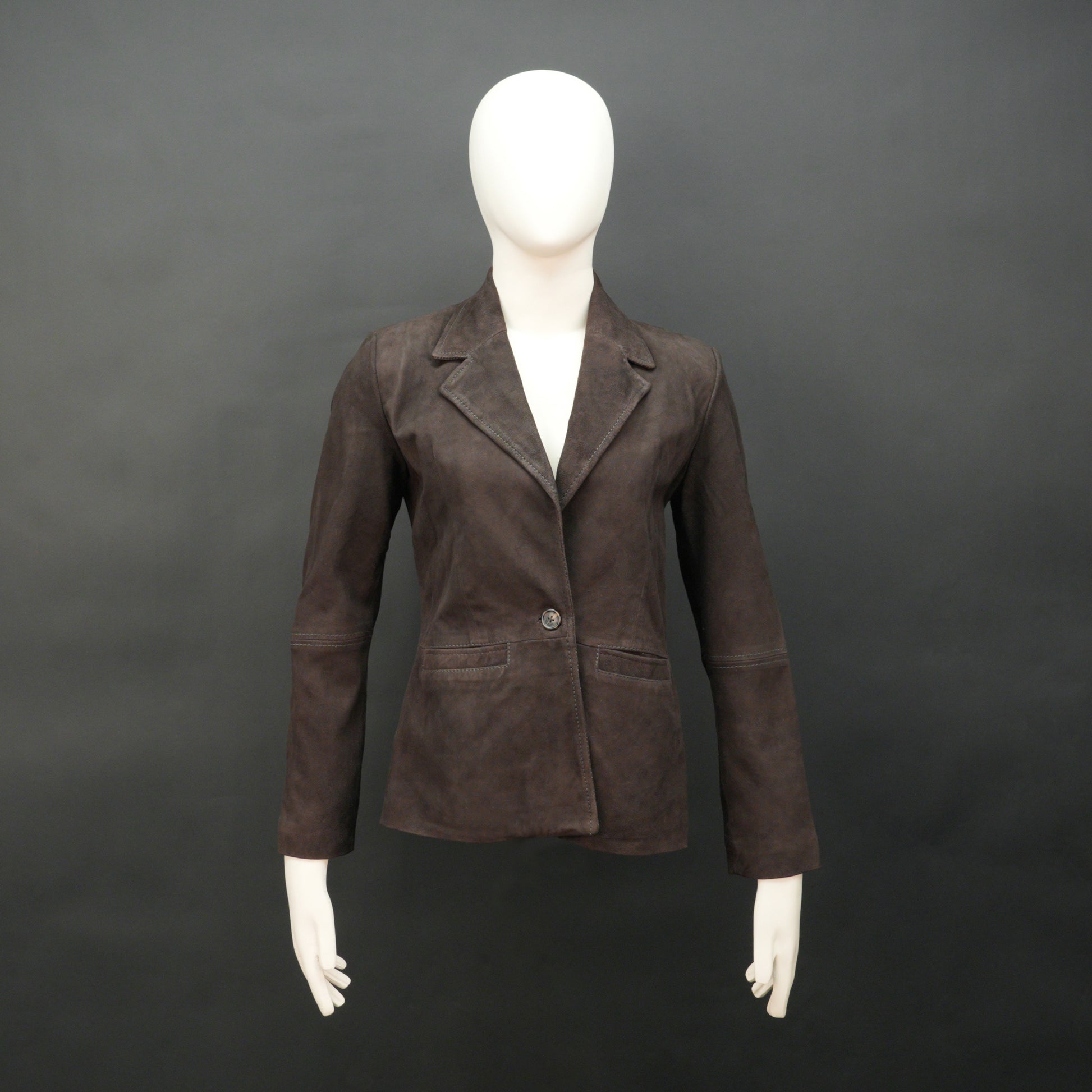 Dark brown goat leather coat with soft, durable material, two functional pockets, and versatile design for casual and formal wear