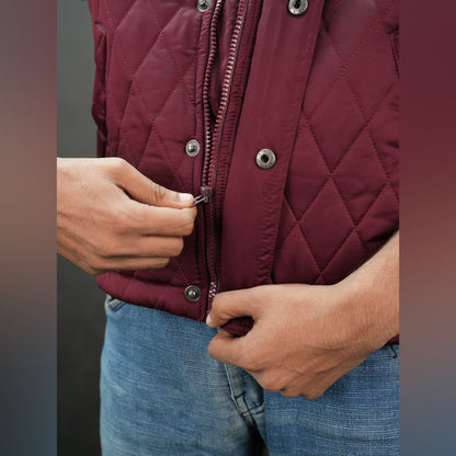 Maroon vest featuring a zip closure with snap button, two snap-button side pockets, and an inside pocket for secure, convenient storage