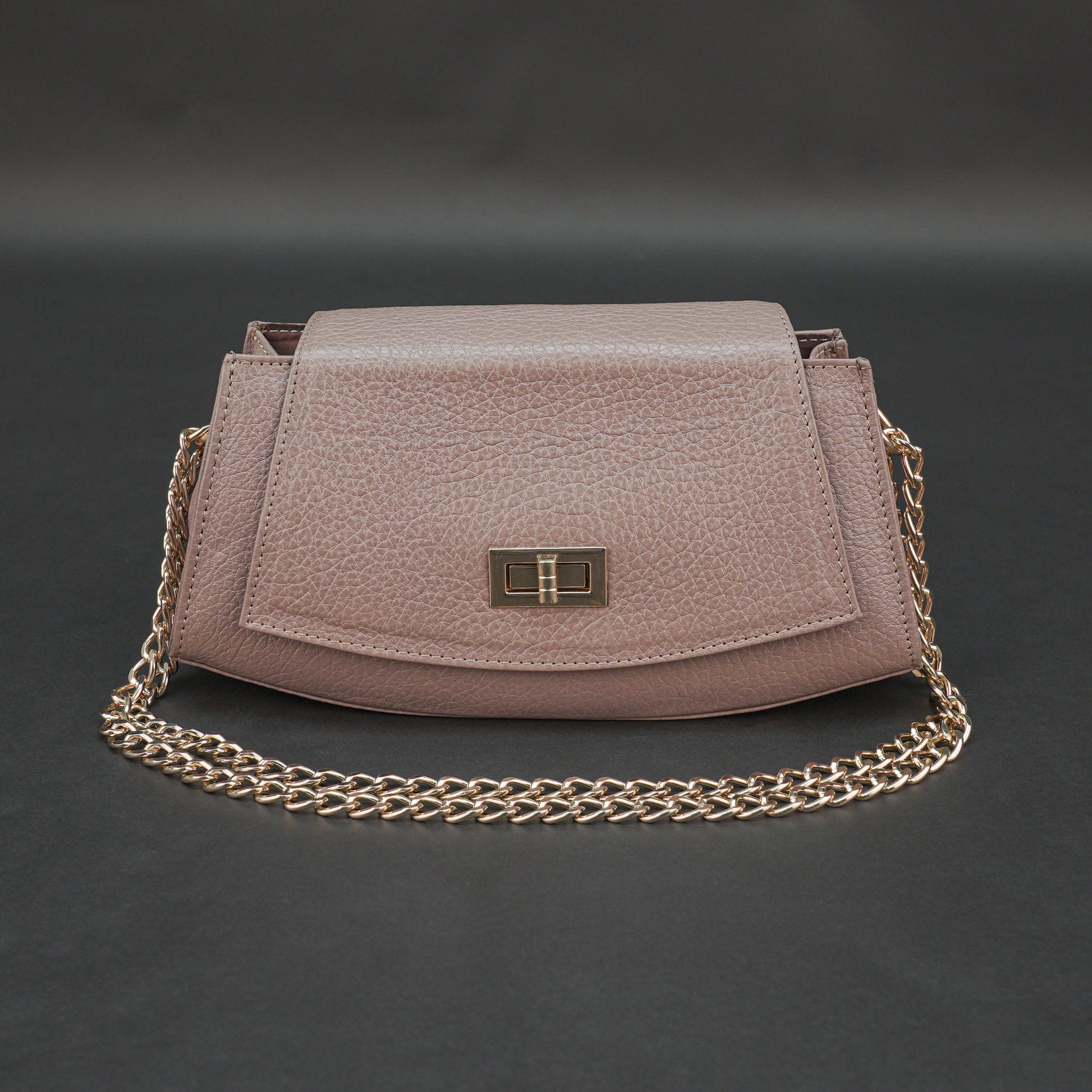 Real leather handbag with brass color chain, zipper compartment, shoulder and hand straps, available in multiple colors for daily use