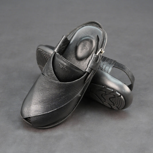 Black cow-printed W-Series leather shoe with goat leather lining, leather and EVA insole, and durable TPR sole.