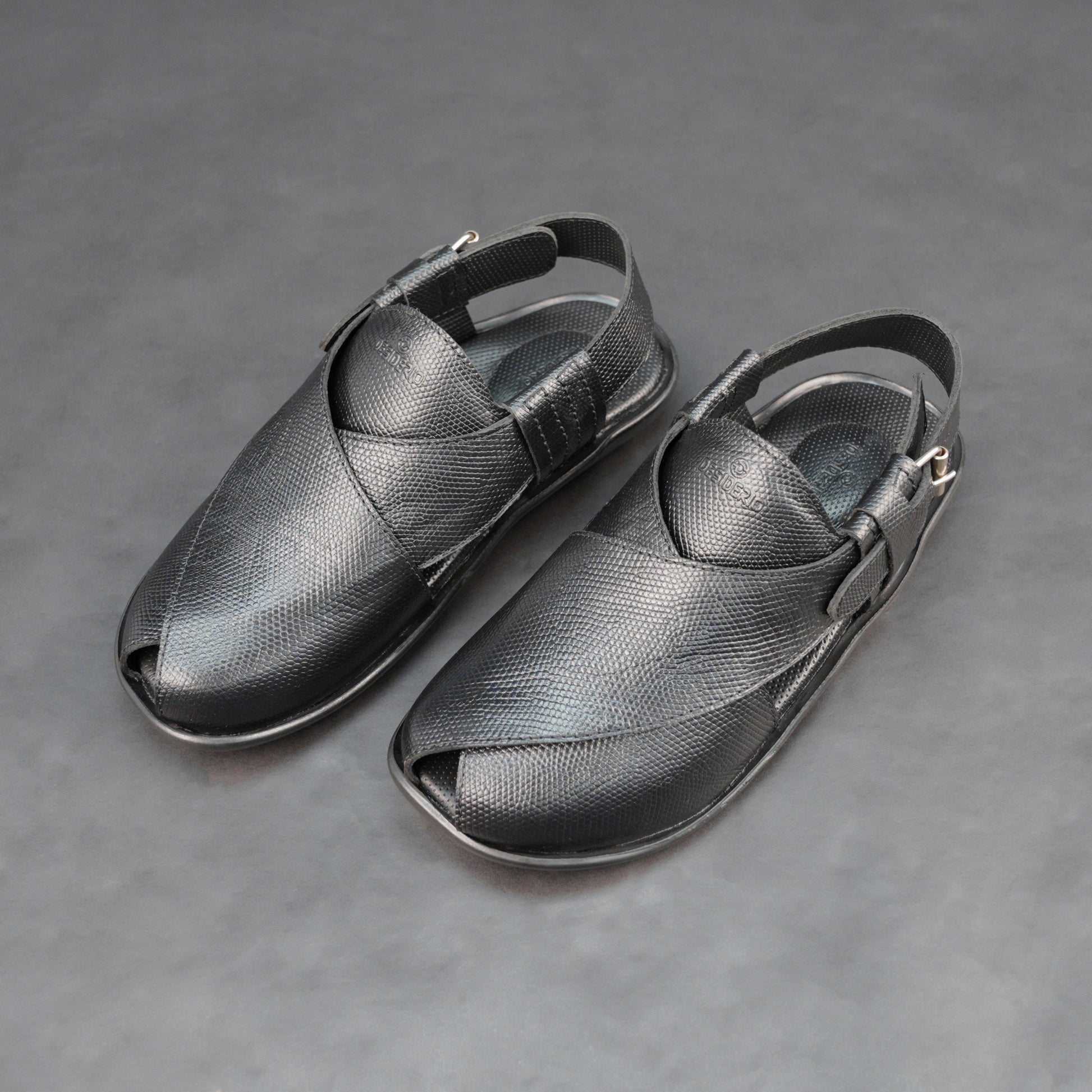 Black cow-printed W-Series leather shoe with goat leather lining, leather and EVA insole, and durable TPR sole.