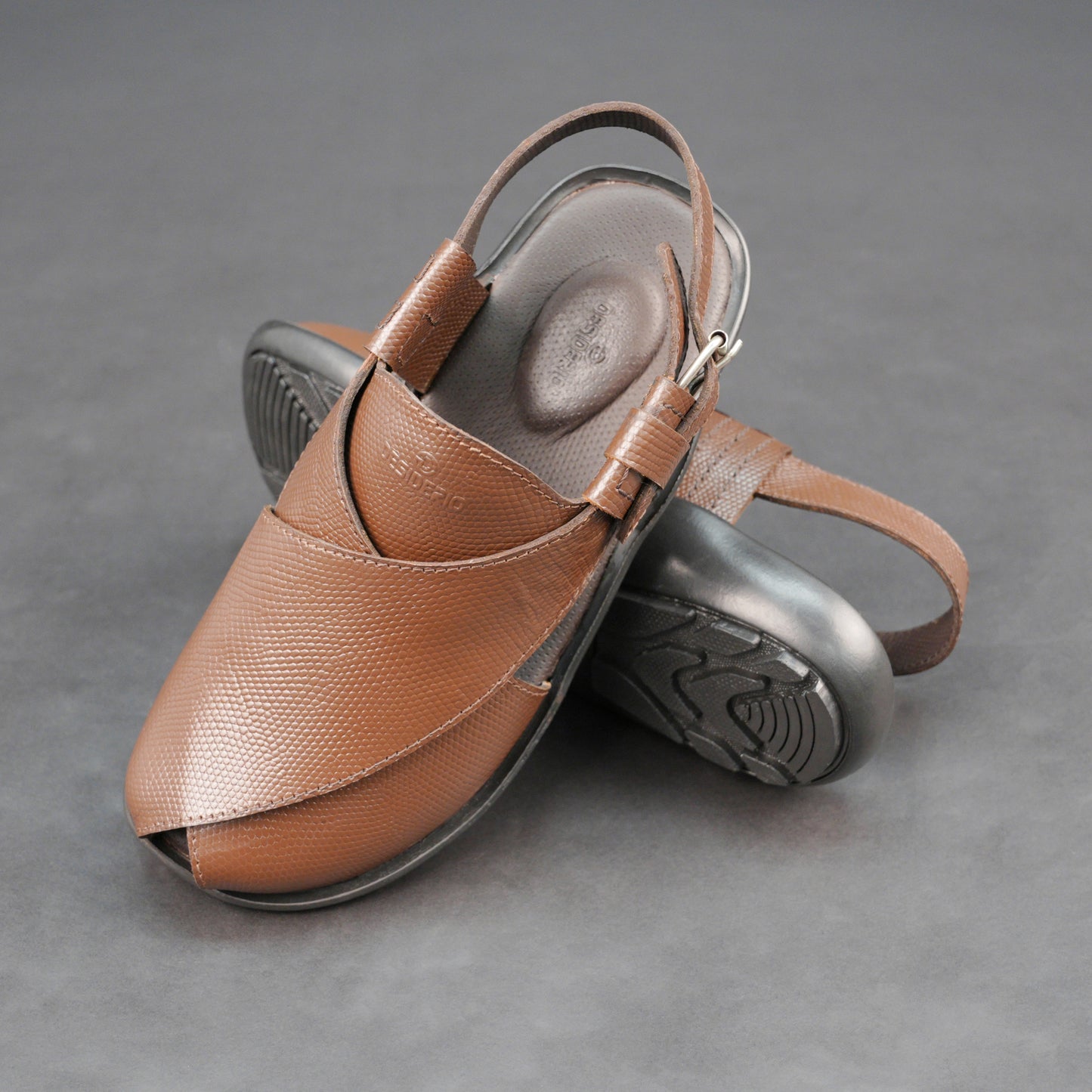 Brown cow-printed W-Series leather shoe with goat leather lining, leather and EVA insole, and durable TPR sole.