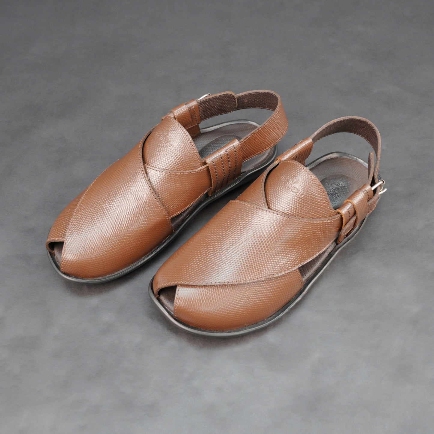 Brown cow-printed W-Series leather shoe with goat leather lining, leather and EVA insole, and durable TPR sole.