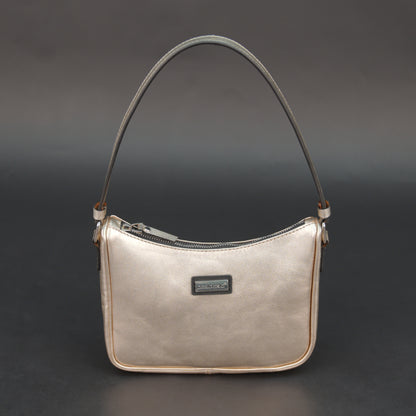 Metallic premium cow leather bag with zip closure, main compartment, and inner pocket for daily use.