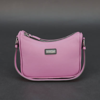 Pink sheep leather bag with zip closure and inner pocket.