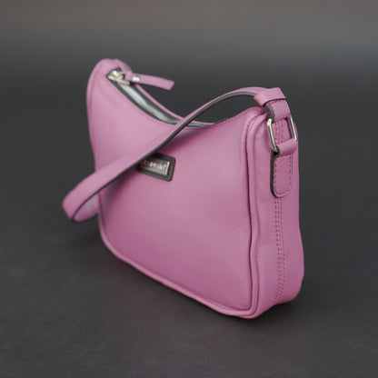 Pink sheep leather bag with zip closure and inner pocket.