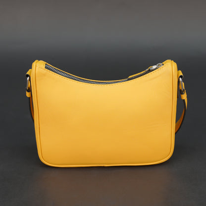 Yellow sheep leather bag with zip closure and inner pocket.