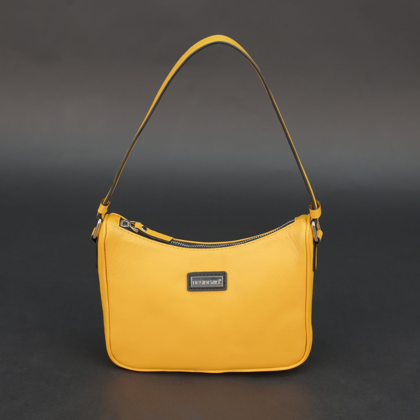 Yellow sheep leather bag with zip closure and inner pocket.