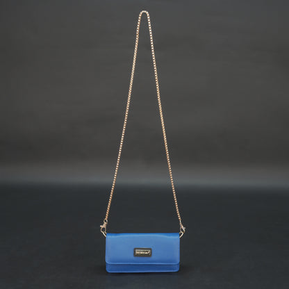 Blue cow PDM leather bag with chain strap, main compartment, and inner pocket.