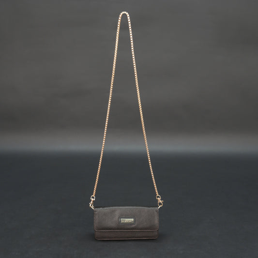 Dark brown goat leather bag with chain strap, main compartment, and inner pocket.