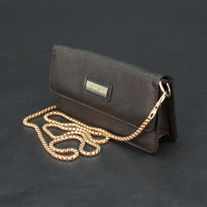 Dark brown goat leather bag with chain strap, main compartment, and inner pocket.