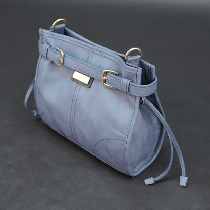 Light blue cow leather bag with shoulder strap, main compartment, and inner pockets.