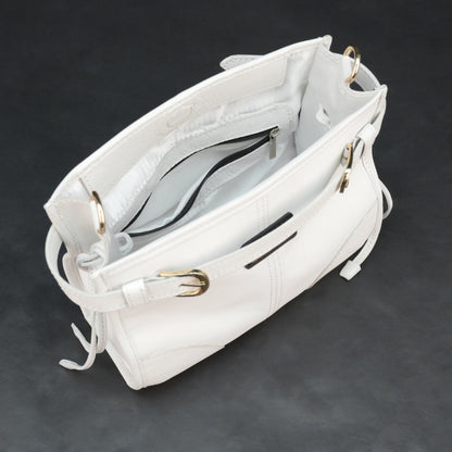 White sheep leather bag with shoulder strap and pockets.