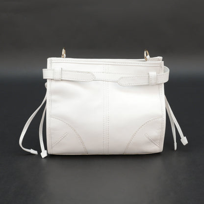 White sheep leather bag with shoulder strap and pockets.